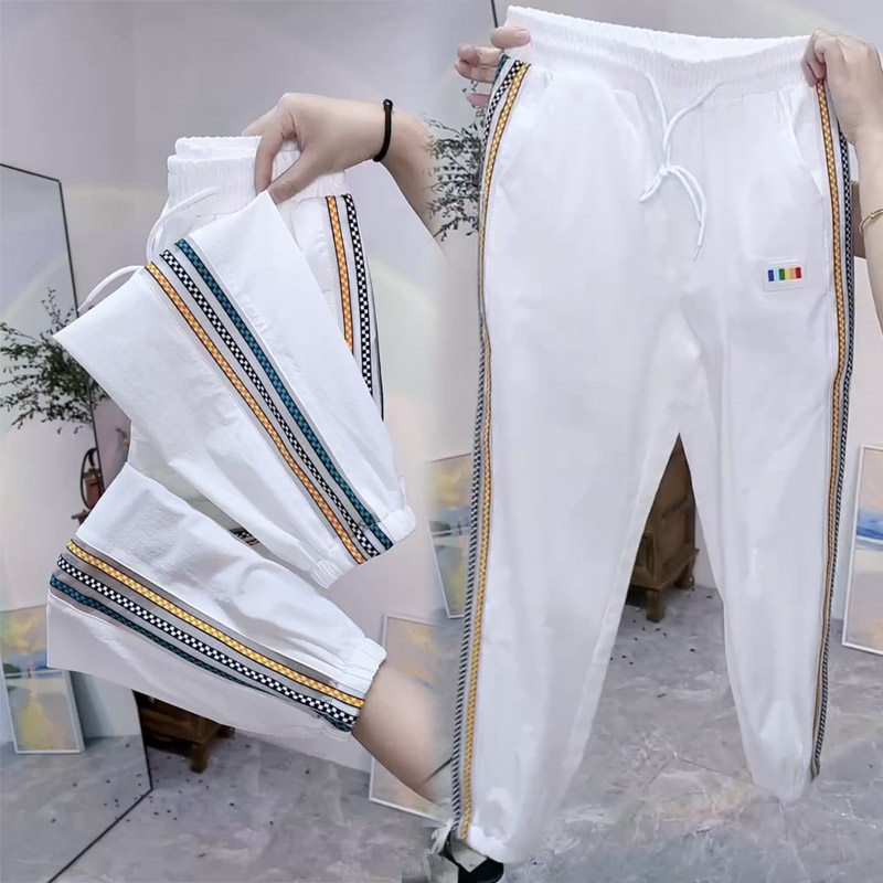 冰丝速干休闲裤女夏季新款显瘦束脚九分哈伦裤宽松透气运动凉凉裤