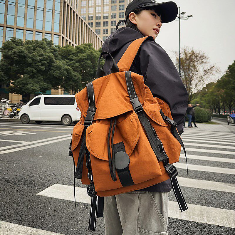 简约新款户外大容量防水轻便双肩包女旅行登山电脑背包男学生书包