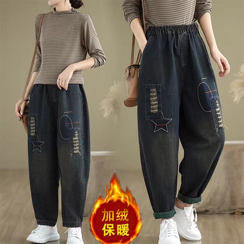 秋冬新款时尚休闲破洞绣花加绒牛仔裤女松紧腰大码宽松加厚哈伦裤