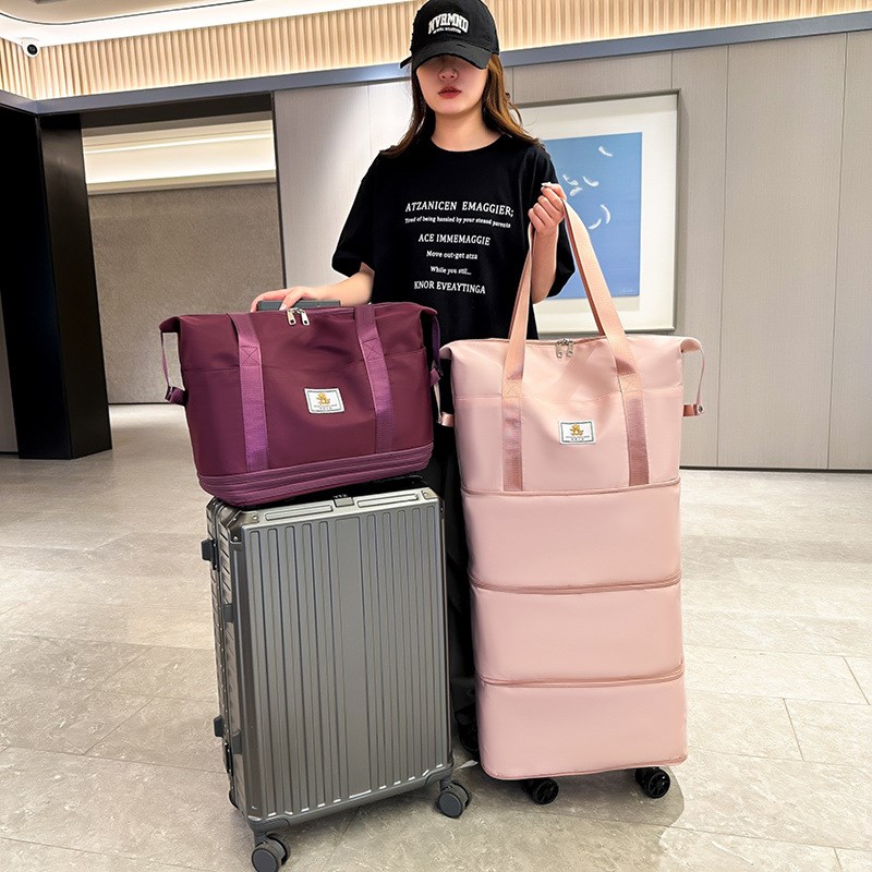 旅行包大容量万向轮学生出差待产收纳包防水三层收缩可扩张行李袋