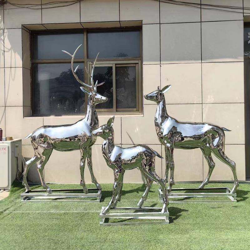 不锈钢摆鹿雕塑HBH镜面何鹿几镂空发光鹿长颈鹿鹿草坪售楼部装饰