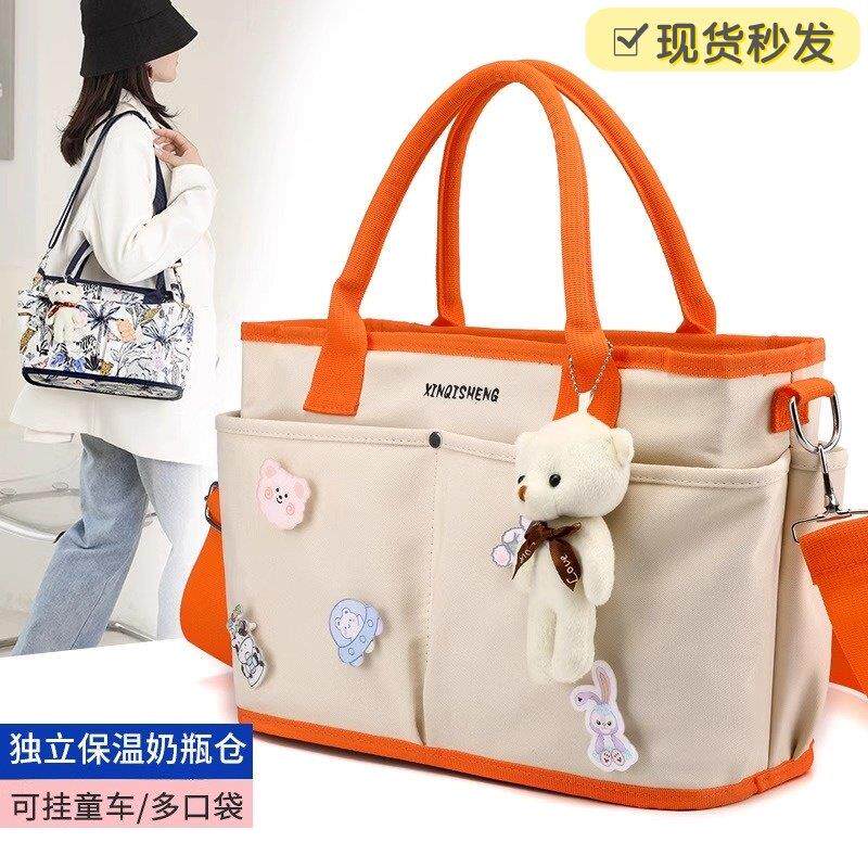 母婴包外出轻便防水大容量单肩斜挎妈咪包妈妈带娃收纳挂车手提袋