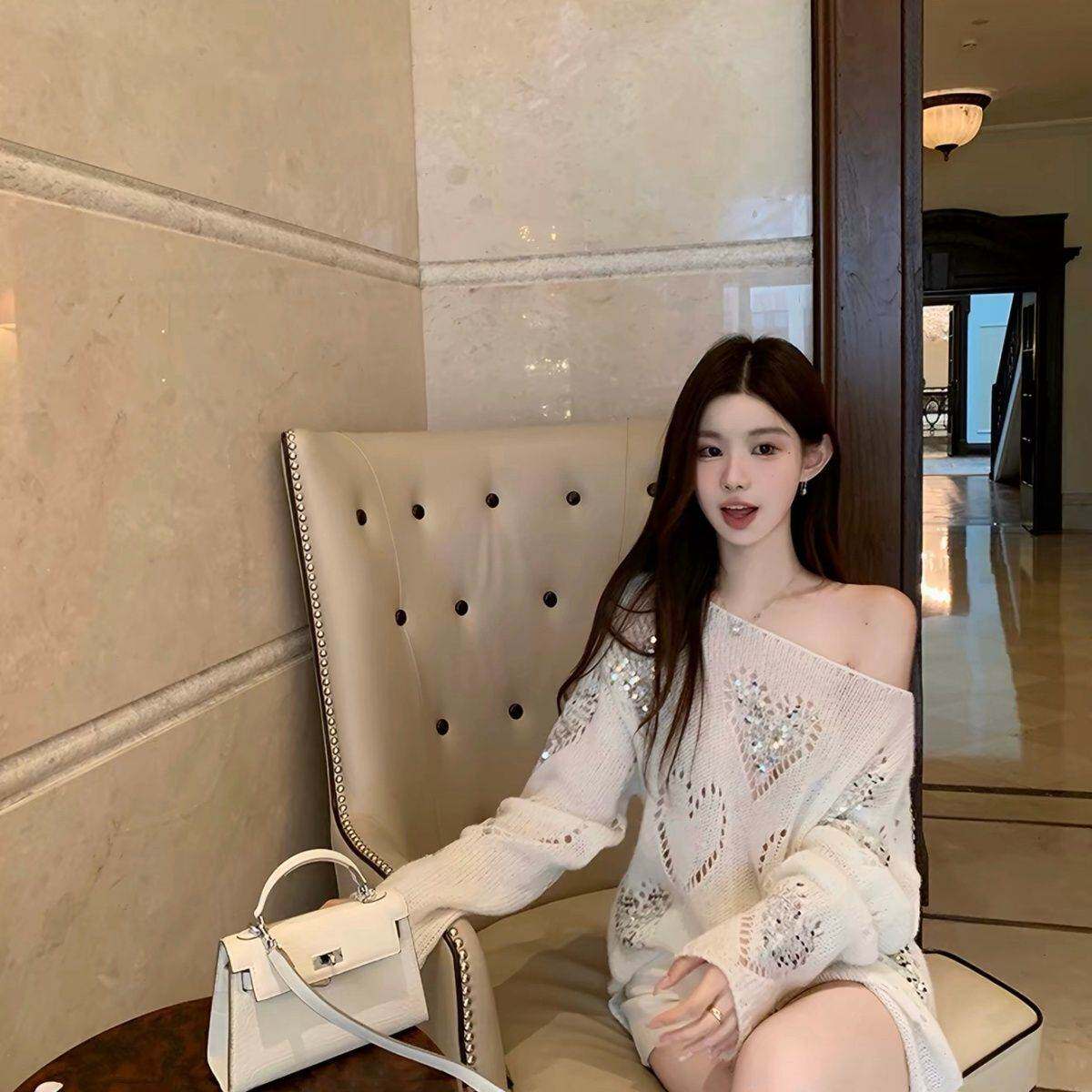 韩系纯欲白色亮片镂空长袖针织衫女早秋季慵懒风休闲毛衣套头上衣