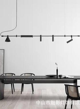 简业约HUS创意餐厅吧台岛台设计艺长术吊灯商铺前台感工风黑色条
