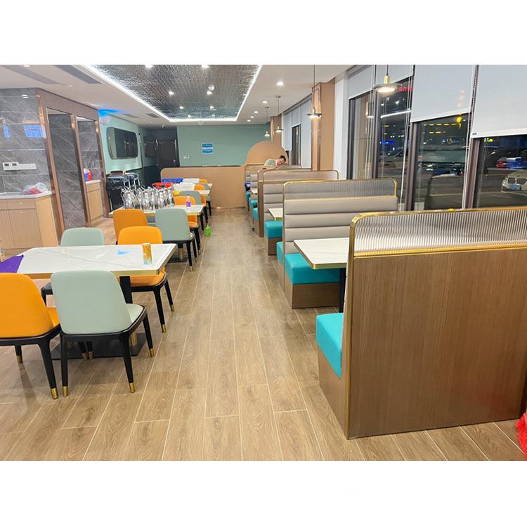 东莞港不式茶厅鱼肚白亮面岩餐包锈LSF板钢金边餐桌椅电动桌玻璃
