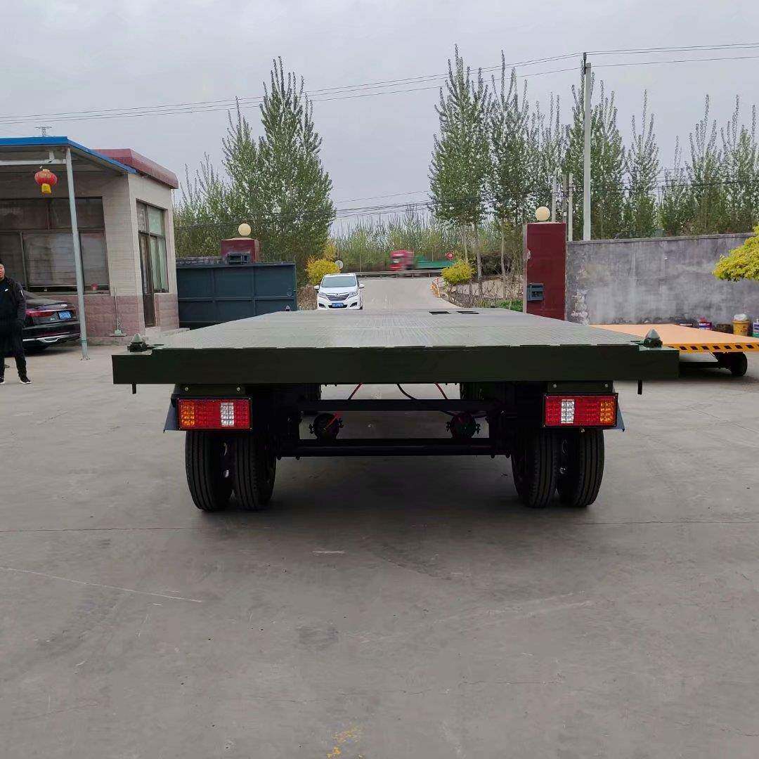 10吨牵引式平板拖向HNZ加灵厚钢板坚固耐用行驶平稳车转活平板车