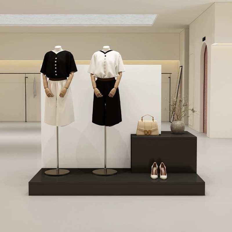 服装店展示柜简约现代中岛台洞石纹女装陈列柜橱窗地台模特展示柜