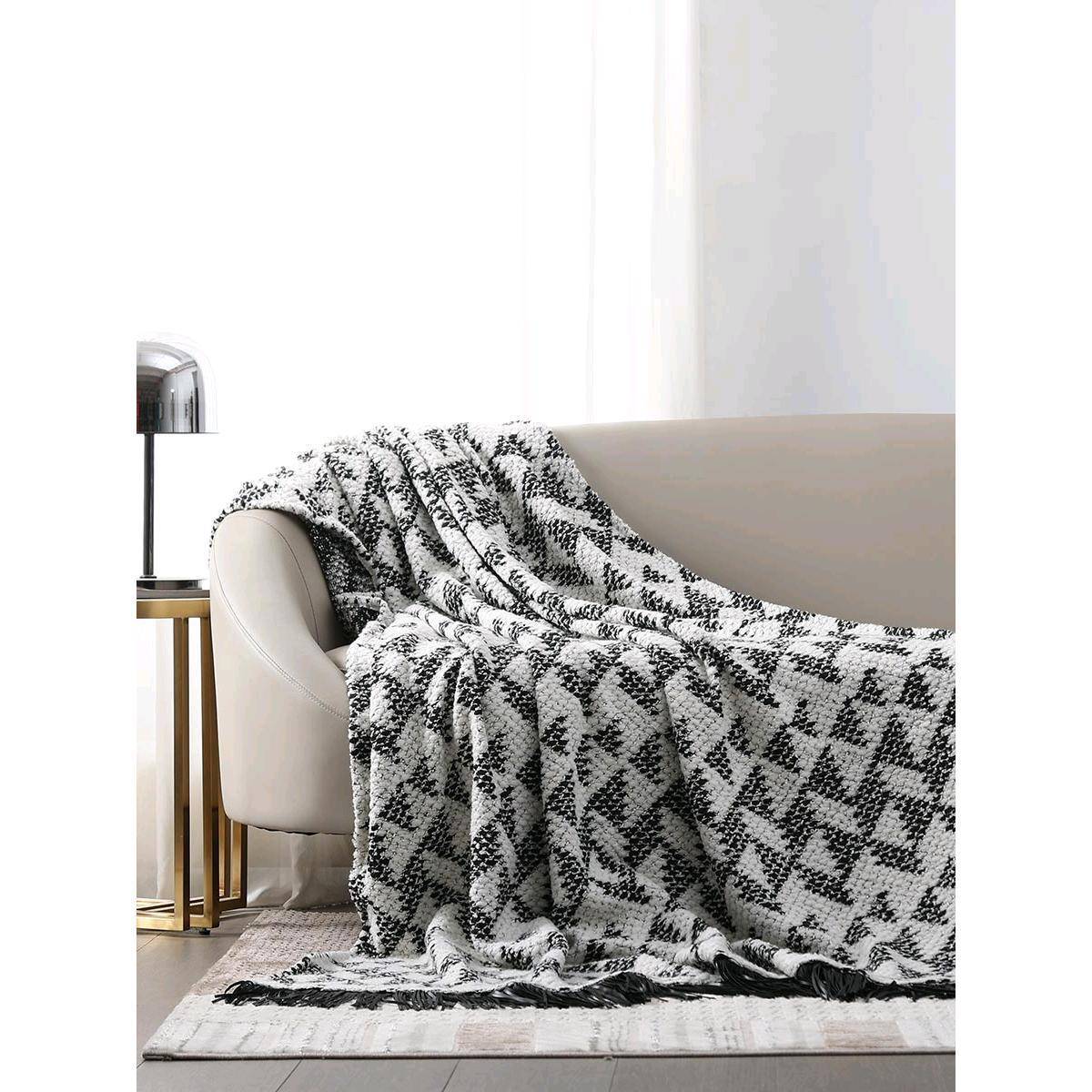 现代北欧时尚皮革流苏搭毯售楼部样板间床尾巾沙发客厅软装休闲毯