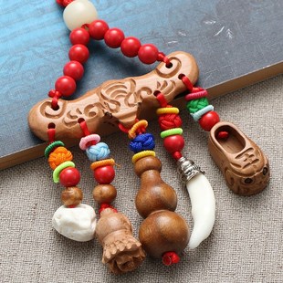 宝宝婴儿挂件新生儿童孕妇别针胸针挂件礼物桃核狗牙老桃木挂件