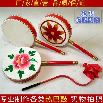 厂家牛皮热巴鼓藏族手柄鼓舞蹈道具学生艺考表演出手鼓定制图案