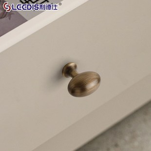 法式覆古黄铜椭圆形柜门把手中古风实心鸽子蛋整体橱柜抽屉衣柜门