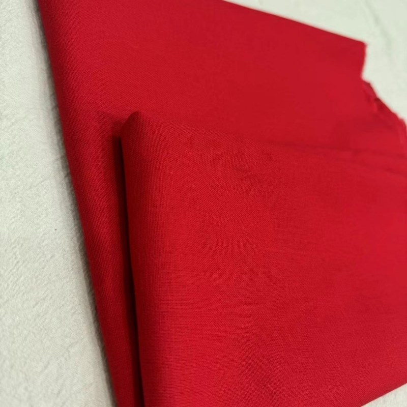棉麻混纺大红色k织物宽度150cm宽裙套布中高档面料