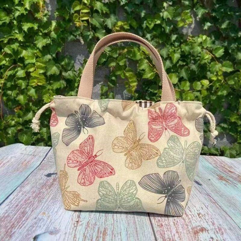 上班族出门c通勤小拎包百搭手提杂物袋可爱2022女款轻便帆布便当