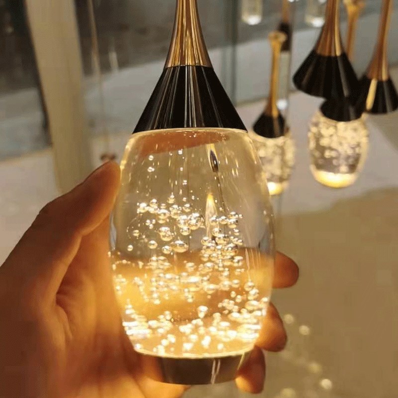 楼梯吊灯现代简约大n气北欧轻奢loft创意别墅复式楼中楼旋转长吊