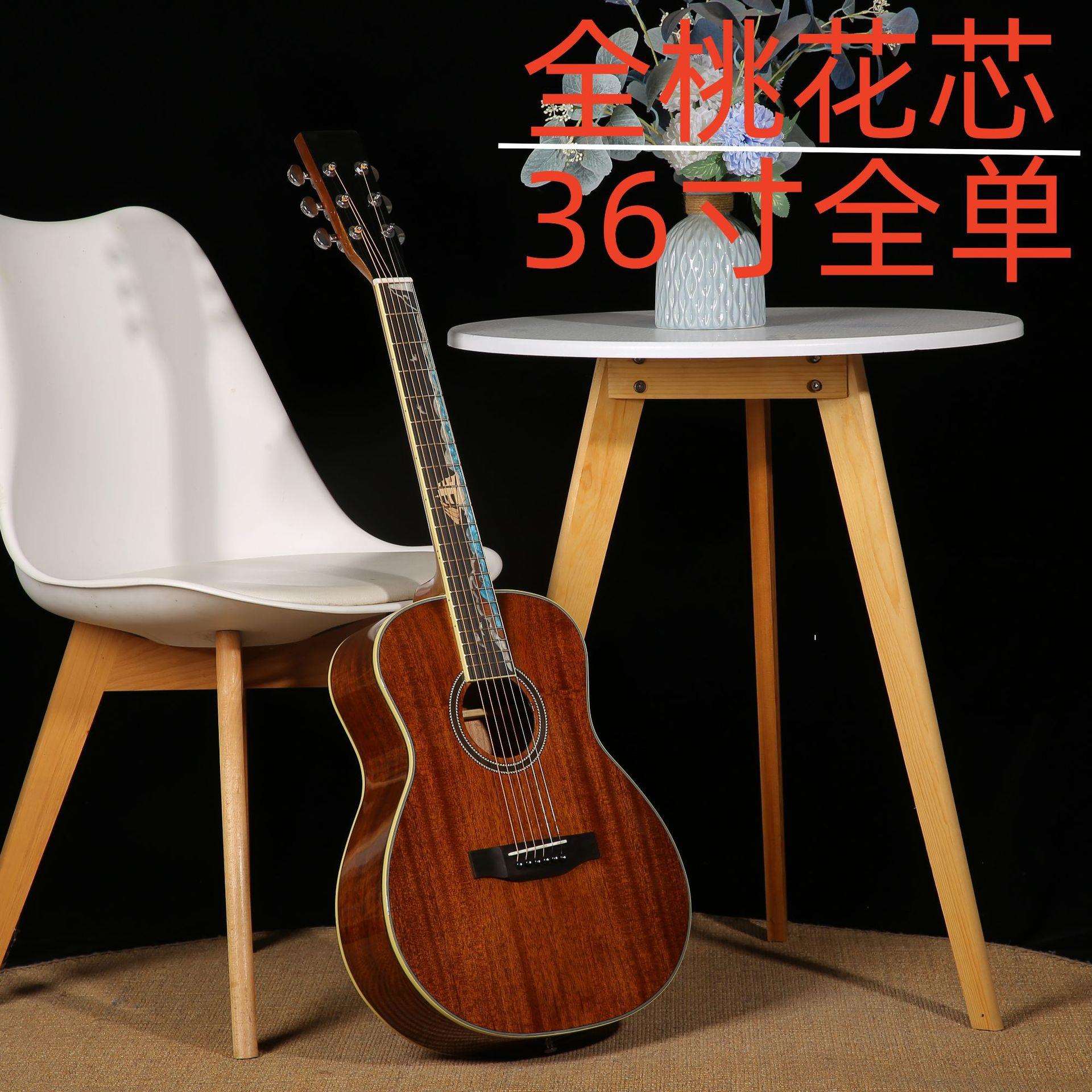 36寸全单吉他民谣旅行吉他OM圆桶云杉全桃花芯全单板帆船指板雕花