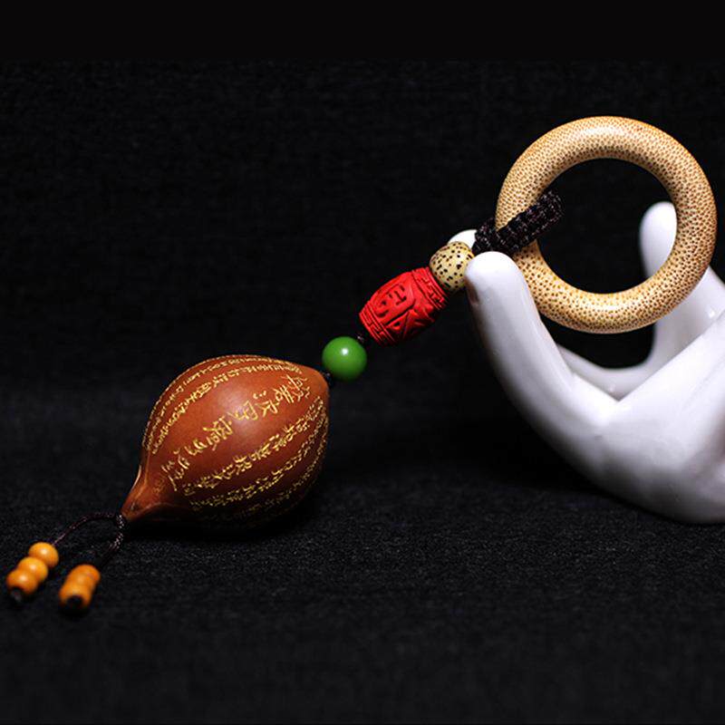 印尼大橄榄核心经单籽手把件 刻字核雕挂坠手把件烫金字核雕