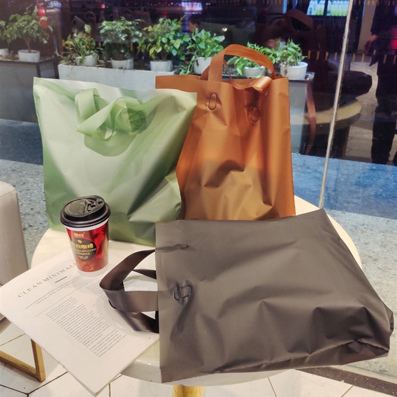 高档磨砂半透明服装店手提袋男女儿童礼品包装塑料袋定W制logo包