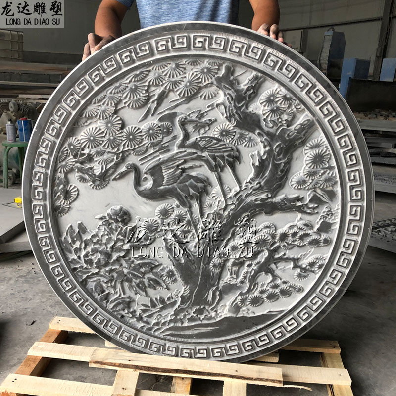 石雕浮雕圆形松鹤壁画大理石雕刻迎客松牡丹回纹边框庭院墙壁装饰图片