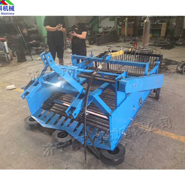 田间管理捡石机 土壤筛石自动装车机 后置牵引式农田石头清理机