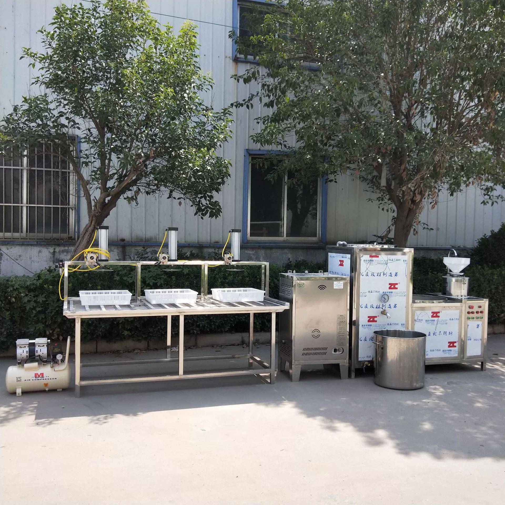 不锈钢气动压榨豆腐机 操作简单的豆腐加工设备 做豆腐的设备