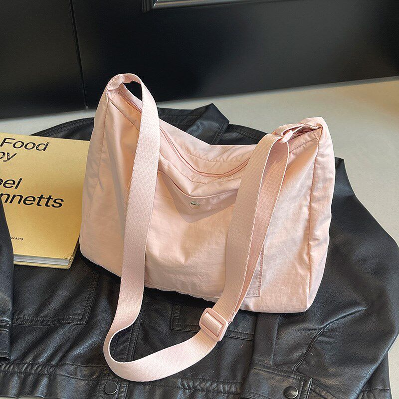 超轻便耐磨帆布斜挎包女休闲百搭户外旅游单肩包大容量纯色通勤包