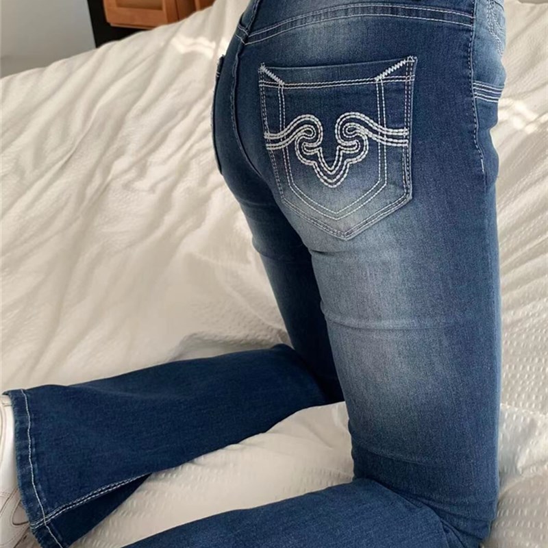 辣妹水洗刺绣微喇叭牛仔裤大尺码女装秋季新款低腰修身显瘦拖地裤