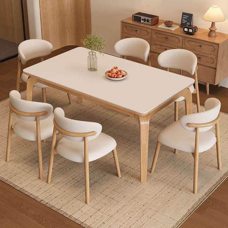 全实木岩板餐桌椅组合小户型家用饭桌新款奶油风长方形原木西餐桌
