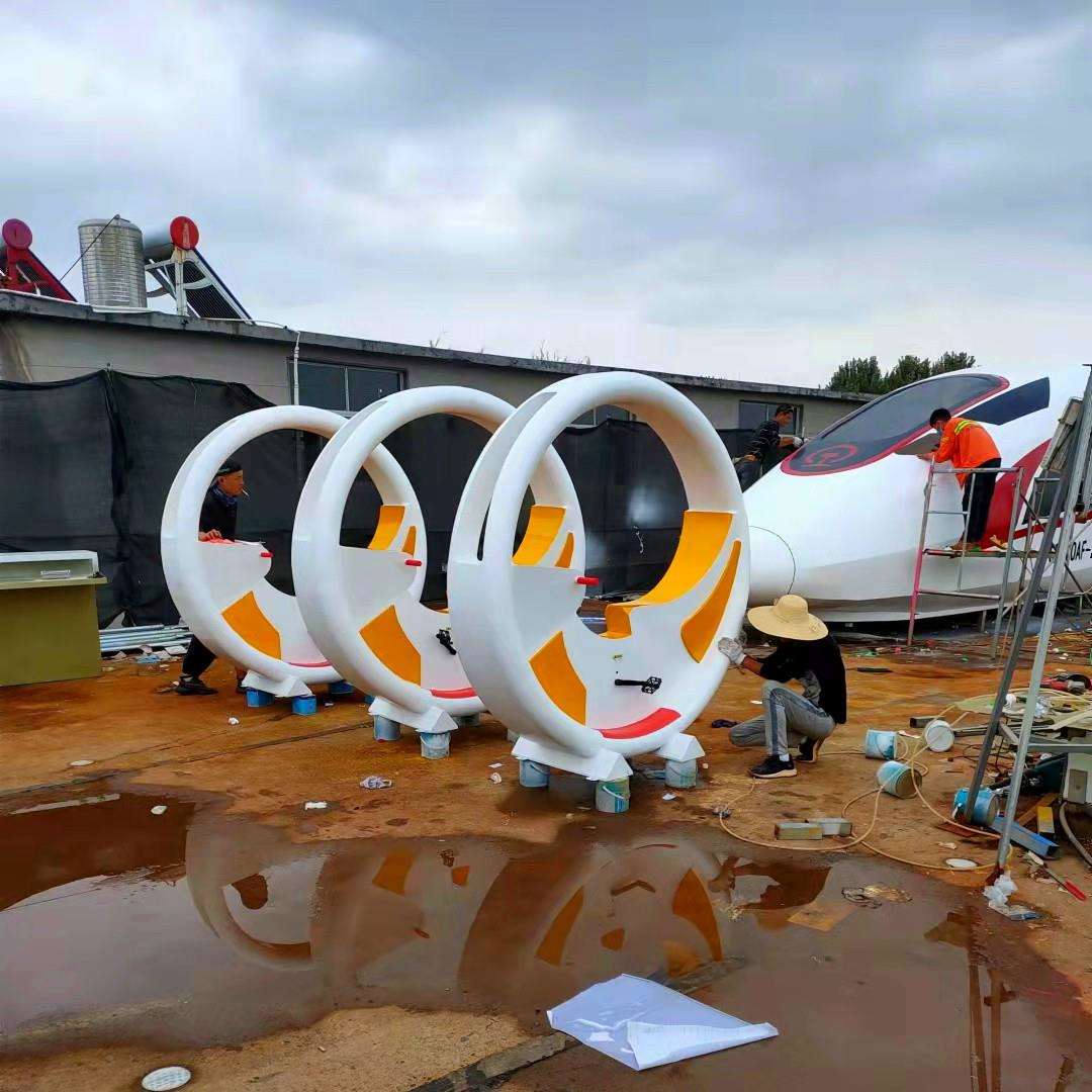 新中式生态湿地滨河公园景观小品亲子互动无动力水车发电灯车