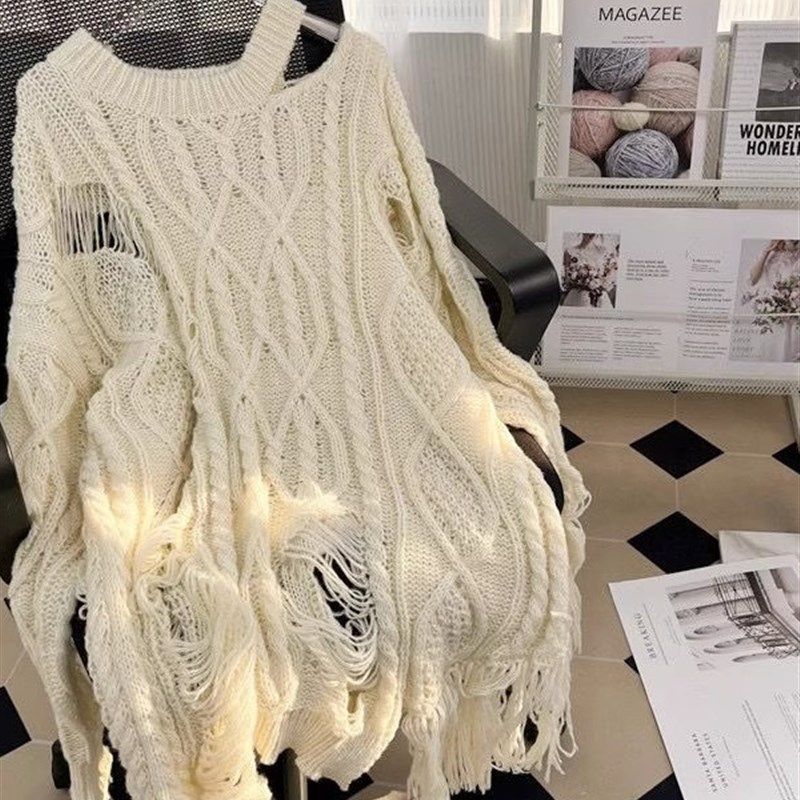 杭州四季青高端女装欧货设计开叉破洞镂空长袖针织衫秋冬桐乡毛衣