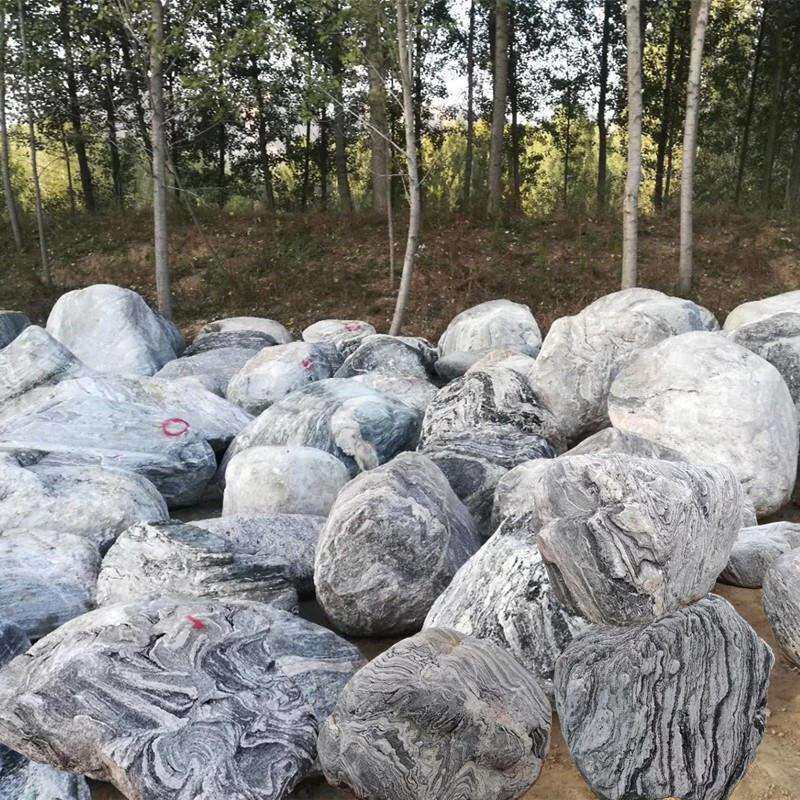 景观置石厂家水冲石用于草坪湖边园林河道摆放河冲泰山石