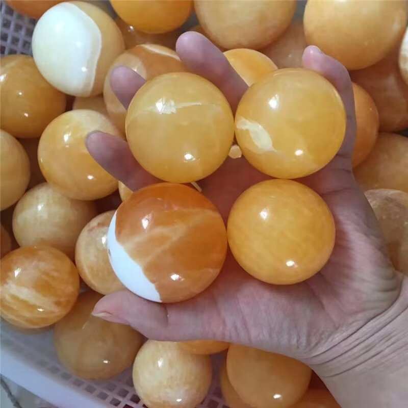 跨境热卖天然水晶球黄色方解石摆件晶洞石打磨圆球摆件装饰品
