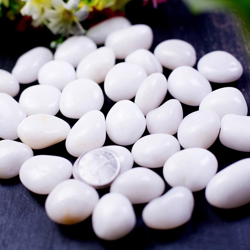 雨花石抛光鹅卵石水洗抛光五彩石黑白黄红石子原产地工程铺路石