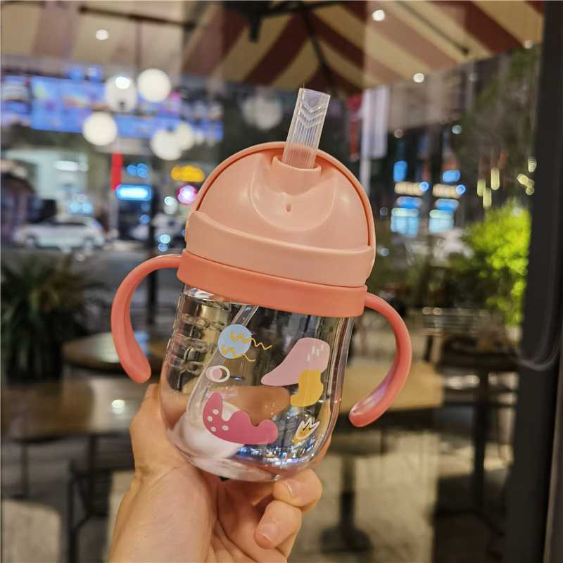 2023婴幼儿V字吸嘴学饮杯可爱卡通宝宝防呛重力球吸管杯手柄杯