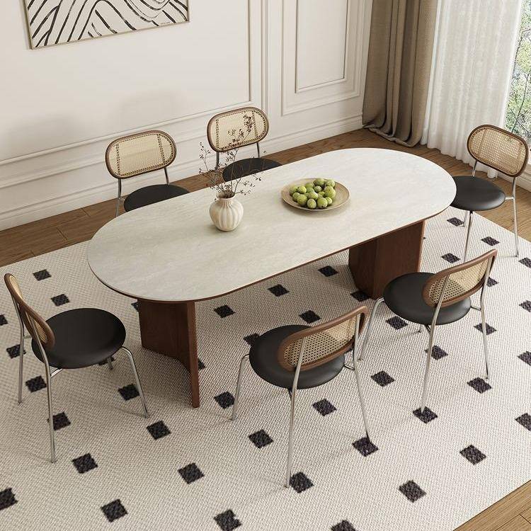 实木餐桌设计师款网红小户型中古风椭圆形洞石岩板餐桌椅