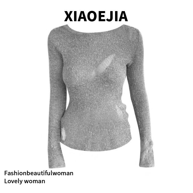 灰色镂空破洞毛衣女款2026新款冬季设计感小众修身显瘦针织衫上衣