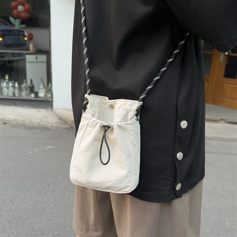 休闲轻便百搭抽绳帆布小包包女2024新款夏季洋气单肩斜挎包手机包,箱包皮具/热销女包/男包,小方包,淘宝优惠券,粉丝福利购,淘宝优惠卷