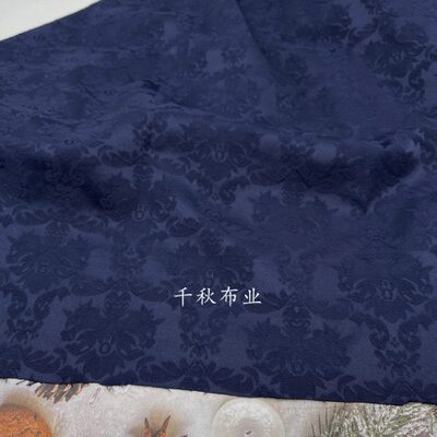 新款挺括弹性藏青色涤棉提花布料春秋时尚浮雕立体花纹重磅面料
