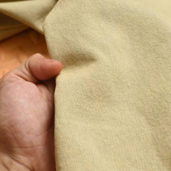超淡绿混黄色双染色品质厚实软垂无弹有质感冈山丹宁水洗牛仔布料