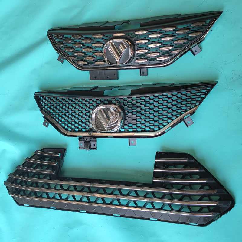 比德文M7电动汽车轿车前保险杠前上中网下中网饰条充电口标志格栅