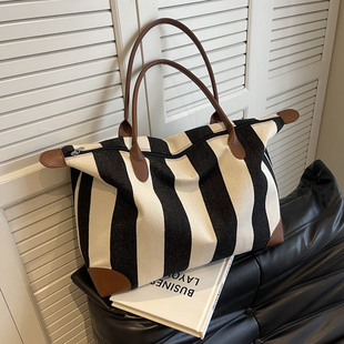 高颜值手提短途旅行包女大容量2024年新款行李袋收纳包瑜伽健身包