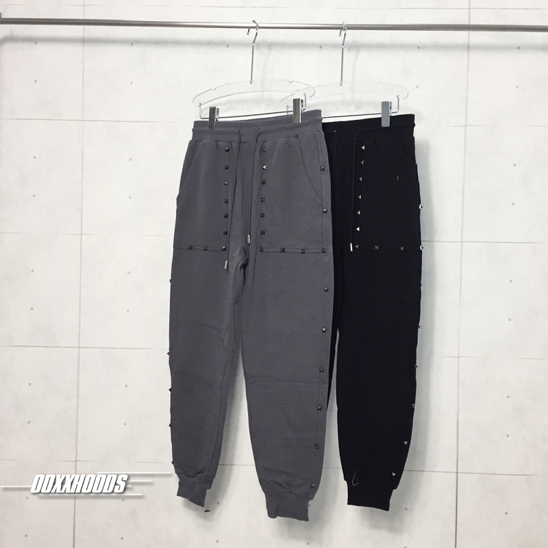2023春装二代口袋侧边铆钉简约纯色休闲时尚百搭男女宽松纯棉卫裤