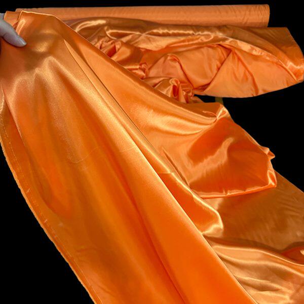 绸缎布料橘红布纯色橙色亮面绸缎布色丁丝绸礼盒拍照装饰背景绸布