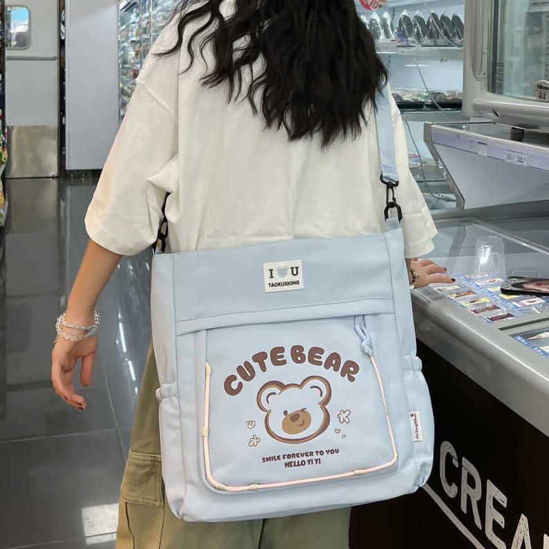 大容量斜挎包女初中生高中生女生单肩补课小学生补习手提袋拎书袋