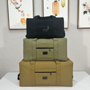 加厚帆布行李包手提旅行包男超大容量打工出差行李包户外旅游新款