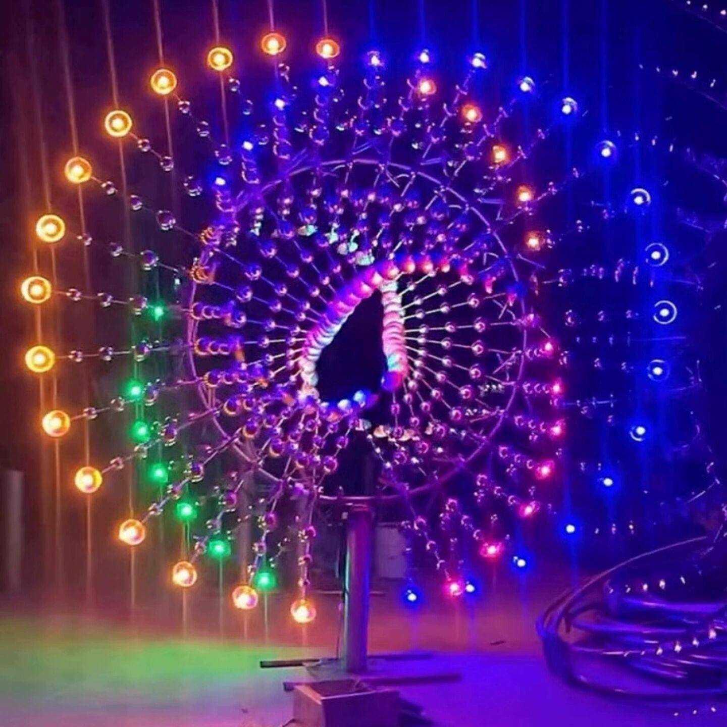 大型户外网红不锈钢风动雕塑太阳花海八爪鱼造型七彩灯光定制厂家