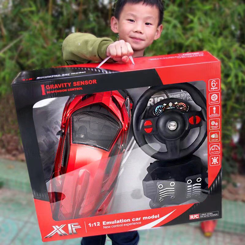 儿童玩具四通遥j控车RC跑车充电仿真方向盘重力感应地摊男