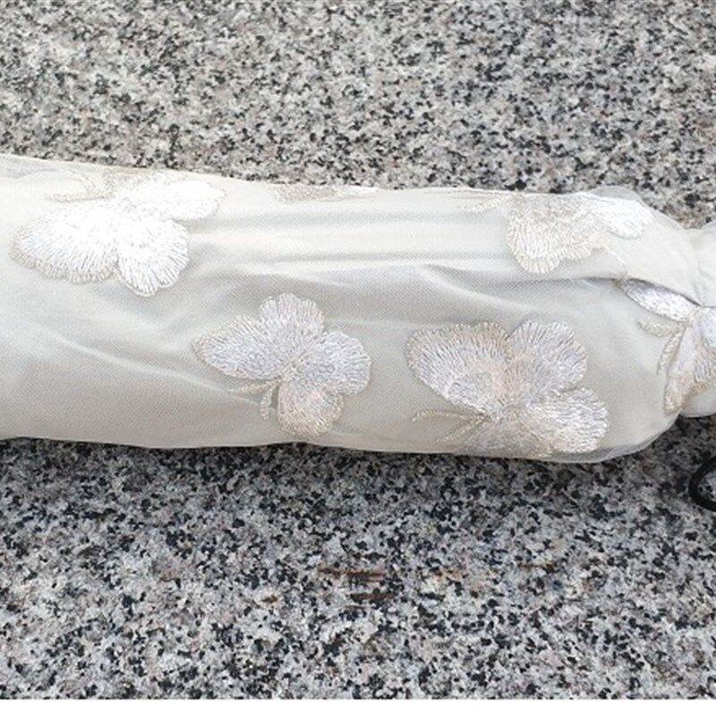 高档二折蕾丝蝴蝶刺绣花亮片米白色防紫外线晴雨伞太阳伞公主洋伞