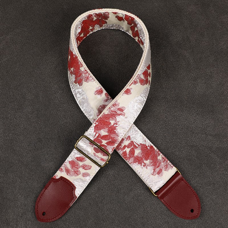 原创牛皮头胭脂点雪通用吉他背带适用各I种电吉他贝斯民谣木吉他