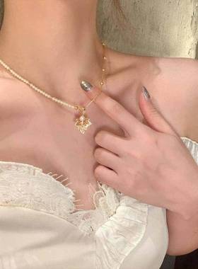 芒果饰品铜合金彷珍珠项炼秋冬轻奢抽拉闪锆枫叶珍珠项炼女毛衣炼