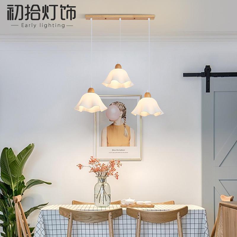 北欧餐厅吊灯床头吧台现代简约轻奢创意设计师三头花朵日式餐桌灯